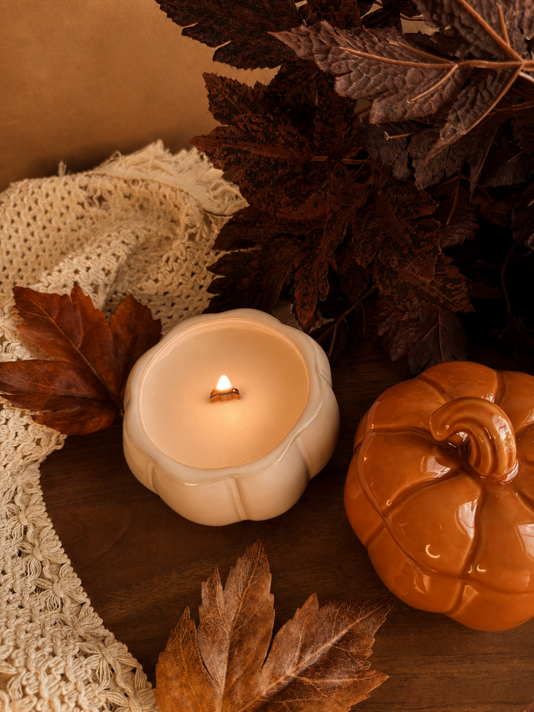 Golden Harvest Ivory pumpkin candle burning
